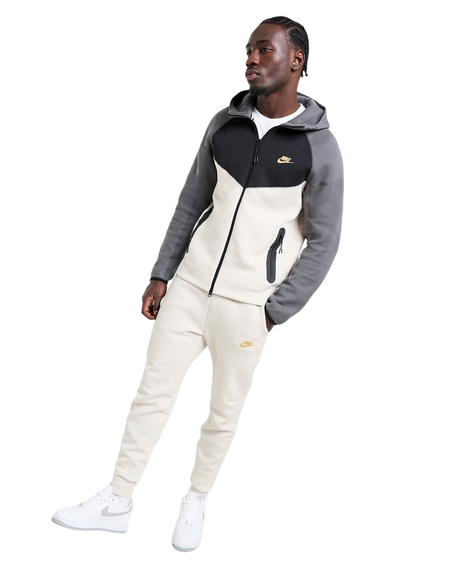 Survetement nike noir et doré sale
